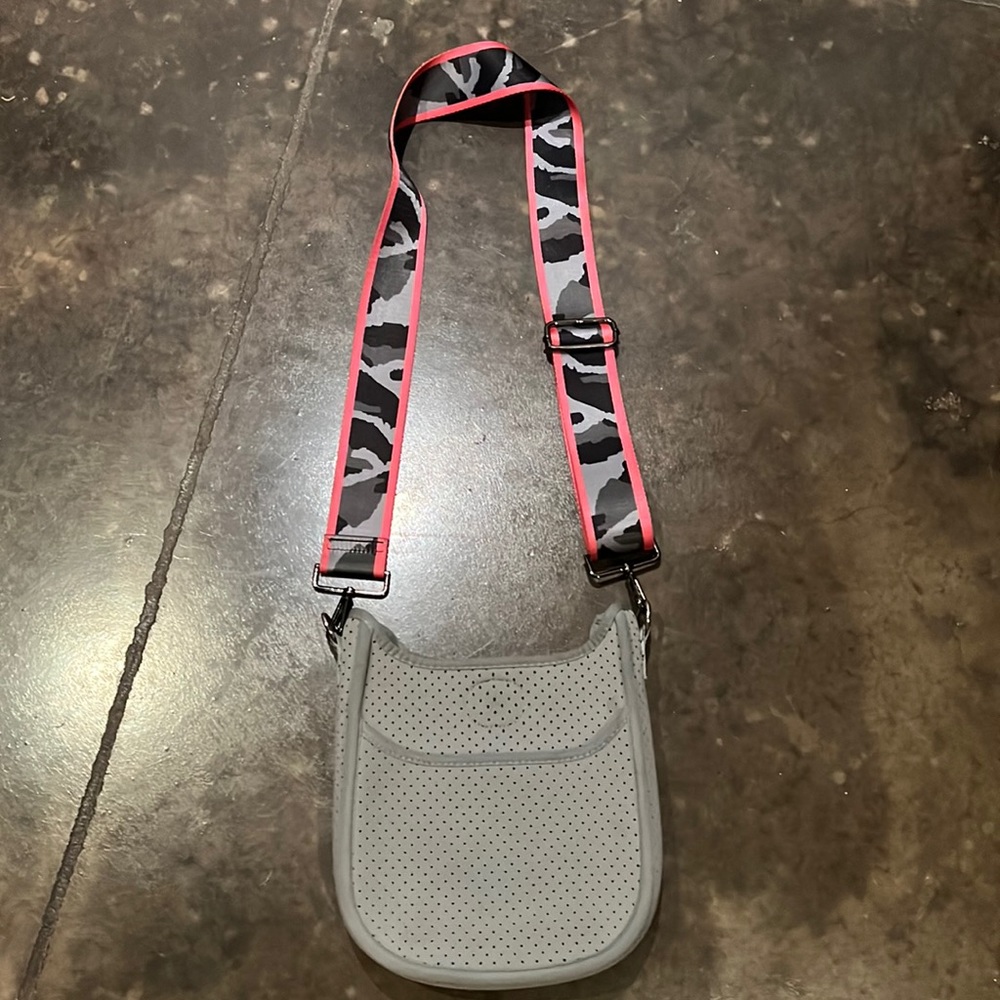 Haute Shore neoprene crossbody bag/ adjustable strap. Great pre-used condition.